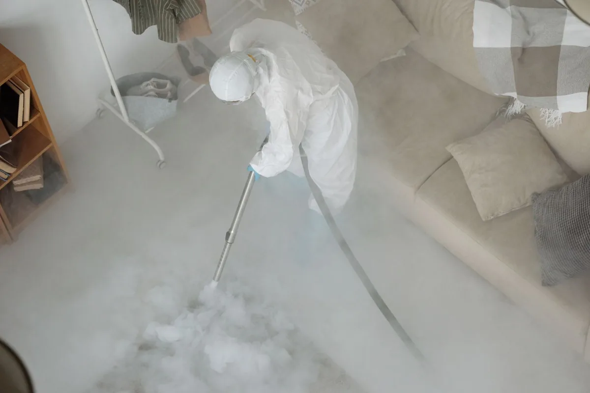 Biohazard cleanup technician in protective equipment, Holiday Valley, OH